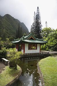 Scenic shot of a pagoda with stream in Iao Valley State Park in Maui, Hawaii.