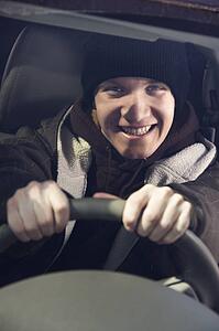 Teenager behind the steering wheel.