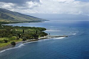 Aerial view of jetty on coastline of Maui, Hawaii