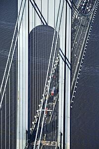 Aerial view of New York City's Verrazano-Narrow's bridge with traffic.