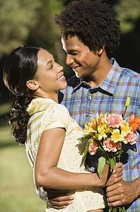 Woman and man embracing