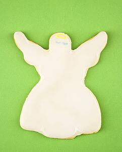 Angel sugar cookie with decorative icing.