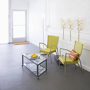 Modern room with arm chairs and coffee table.