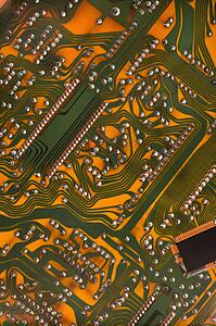 Orange circuit board detail.