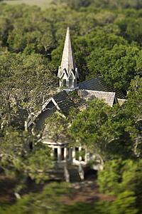 Aerial view of church surrounded by trees on Bald Head Island, North Carolina. 