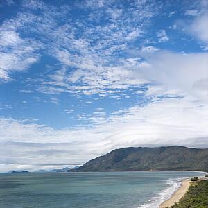 Queensland Rex Lookout with mountains in background under blue sky with clouds