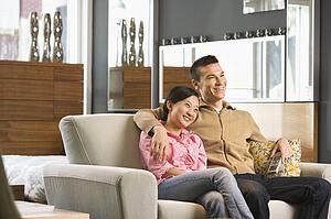 Couple watching television.