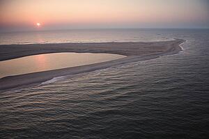 Scenic aerial view of sandbar at Baldhead Island, North Carolina at dusk