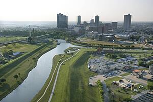 Aerial view of Fort Worth, Texas with view of Trinity River and skyscrapers.