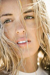 Close up headshot of pretty blonde woman