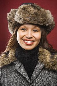 Portrait of woman in coat and hat