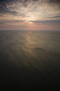 Scenic Bald Head Island North Carolina landscape of sunrise over ocean.