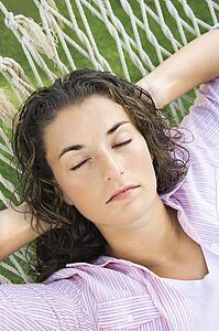 Woman resting in hammock