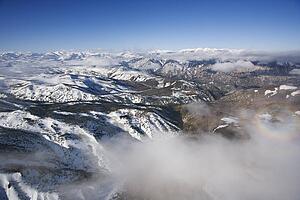 Aerial of snow covered Sweetwater mountain range in California, USA