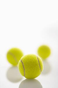 Three tennis balls