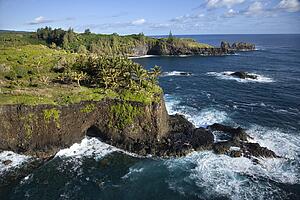Aerial of rocky coast on Pacific ocean in Maui, Hawaii