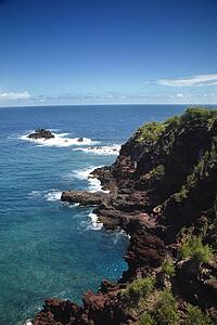 Aerial view of rocky cliffs on coastline of Maui, Hawaii