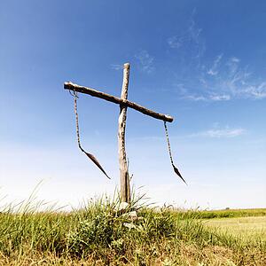 Ceremonial burial site in remote field.
