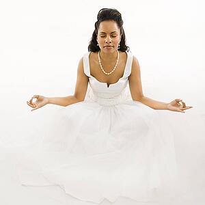Bride mediating with white background