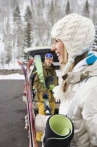 Couple with ski equipment 