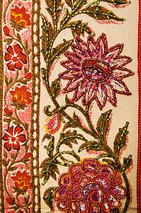 Detail of colorful floral patterned fabric.