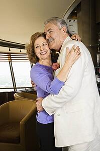 Couple embracing and smiling