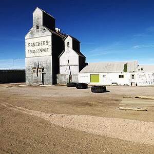 Feed storage building in rural setting.