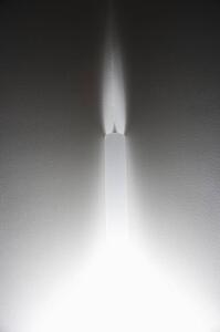 Interior of wall with sconce lighting.