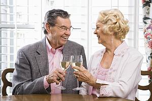 Couple toasting wine glasses