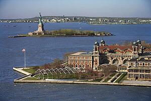 Aerial view of Ellis Island with Statue of Liberty, New York City