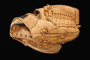 Baseball glove on black
