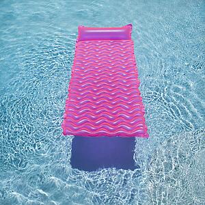 Pink lounge float in empty swimming pool.