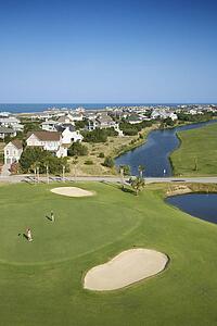 Aerial view of golf course in coastal residential community at Bald Head Island, North Carolina.