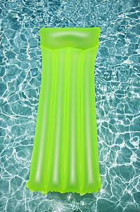 Yellow float in empty swimming pool with rippling blue pool.