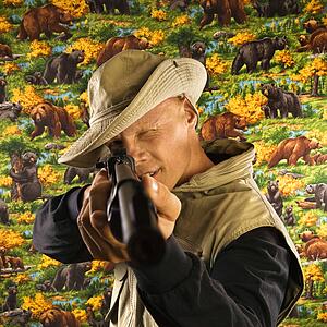 Male pointing a rifle 