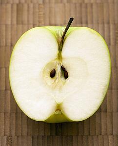 Close up of sliced green apple.