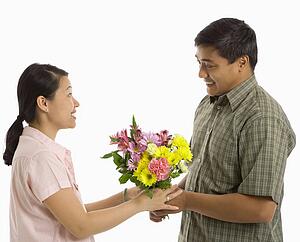 Giving a bouquet of flowers