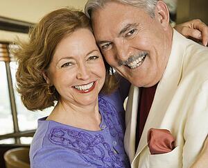 Couple embracing and smiling