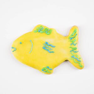 Sugar cookie in shape of a fish with decorative icing.