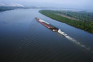 Aerial of barge on Mississippi River in Baton Rouge, Louisiana