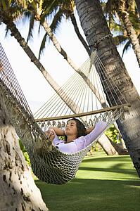 Lying in hammock 