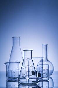 Glass science containers with blue tint.