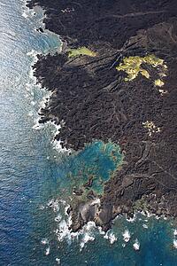 Aerial of Maui, Hawaii coastline with lava rocks