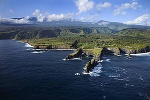Aerial of rocky coast on Pacific ocean in Maui, Hawaii