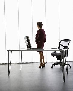 Middle aged businesswoman standing in office