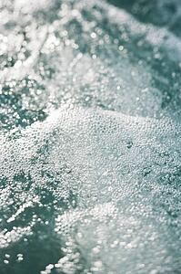 Churning water with air bubbles.