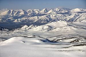 Aerial of snow covered mountain range in California