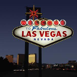 Lighted Las Vegas, Nevada welcome sign with night sky.