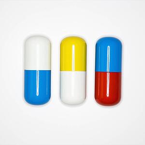 Medical pills on a white background.