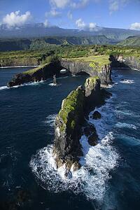 Aerial of rocky coast on Pacific ocean in Maui, Hawaii.